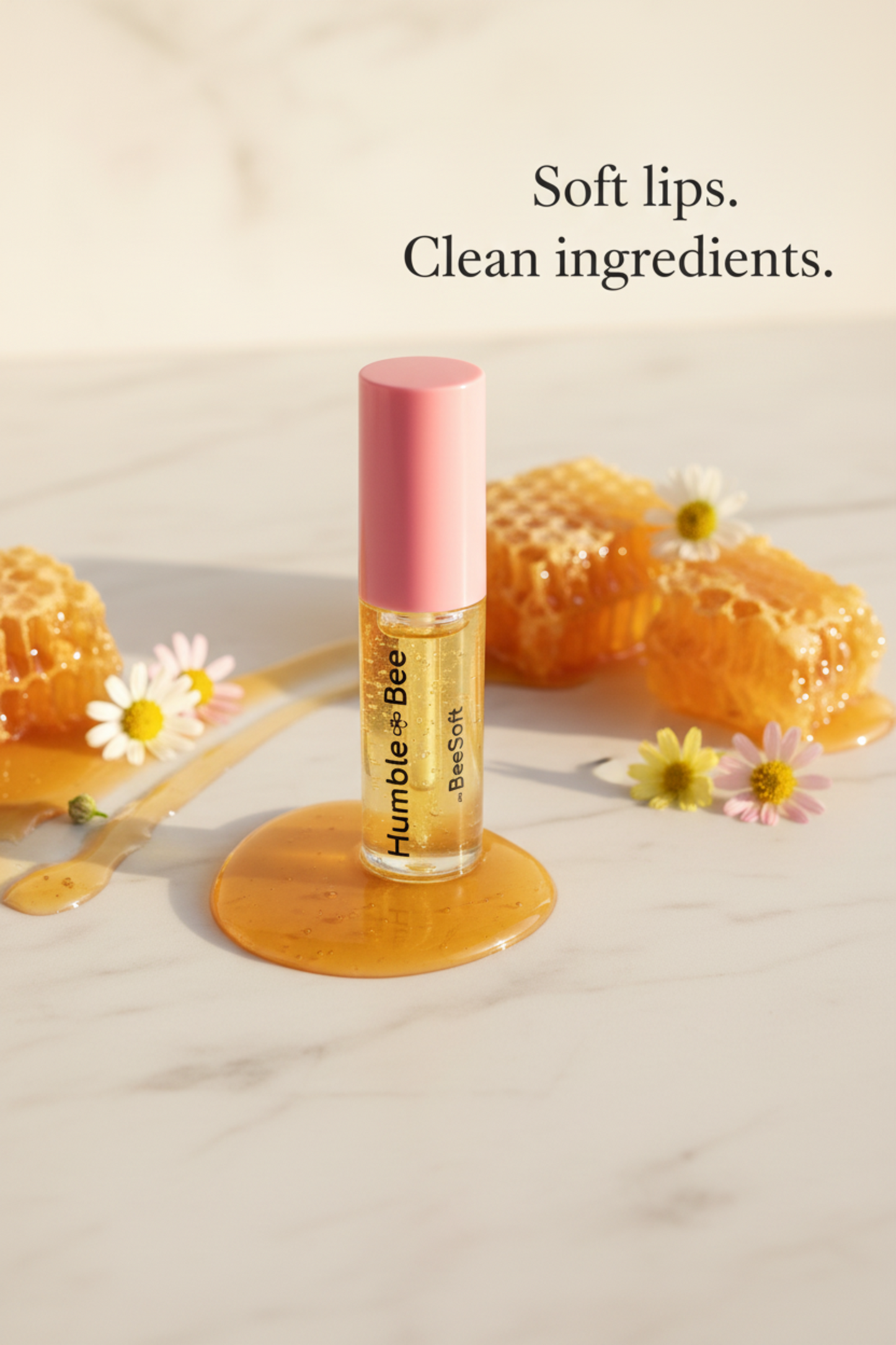 BeeSoft Humble Bee clear lip oil with pink cap — jojoba and castor oil hydrating formula