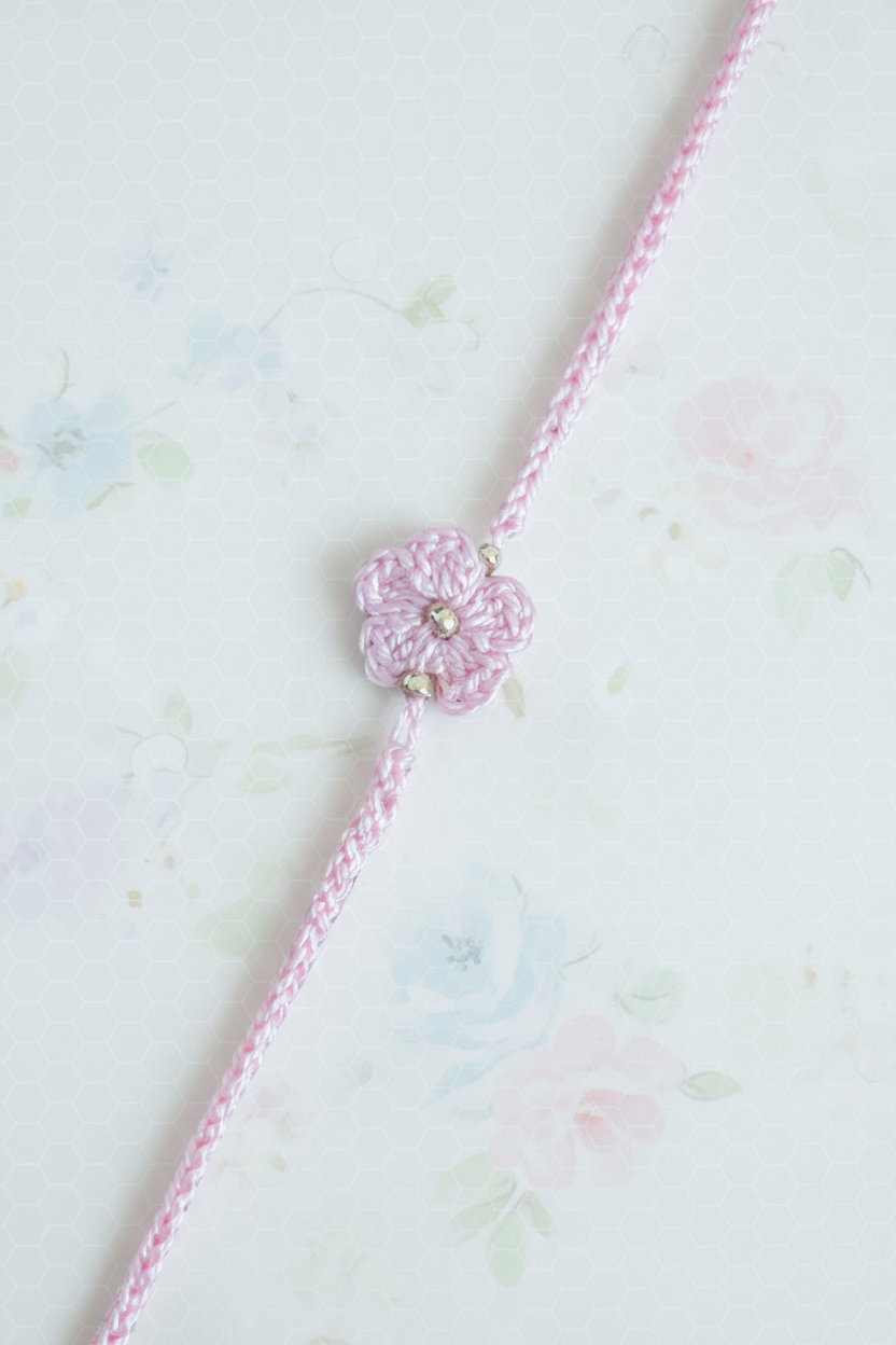 fine thread pink daisy rakhi